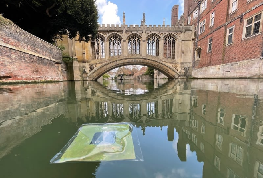 A floating artificial leaf being tested on the River Cam in front of the Bridge of Sighs at St John's College. Top photo: The thin perovskite-BIVO artificial leaf set up to show how the leaves would work on a large scale.