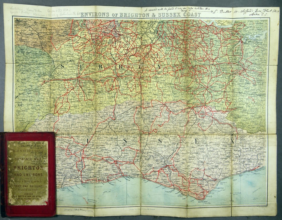 Printed colour pocket map with routes marked in red ink
